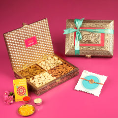Assorted Dryfruit in a Royal Elephant Metal Box with Flower Rakhi