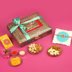 Assorted Dryfruit in a Royal Elephant Metal Box with Flower Rakhi