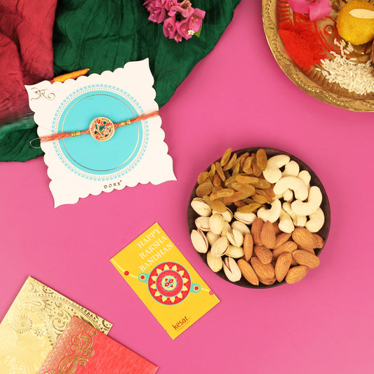 KESAR ROYAL PINK DRYFRUIT BOX WITH RED FLOWER RAKHI