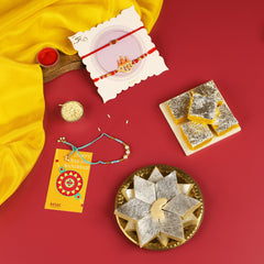 KAJU KATLI AND MOONG THAL MITHAI COMBO WITH SET OF 2 RAM RAKHI SET