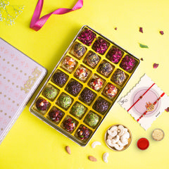 Assorted Gourmet 24 pcs Laddoos in a Tin Box With 2 Rakhis