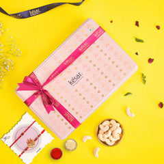 Assorted Gourmet 24 pcs Laddoos in a Tin Box With 2 Rakhis