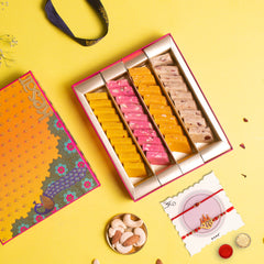 Assorted Flavourful Katli in a Classic Gift Box with 2 Rakhis