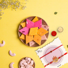 Assorted Flavourful Katli in a Classic Gift Box with 2 Rakhis