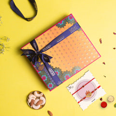 Assorted Flavourful Katli in a Classic Gift Box with 2 Rakhis
