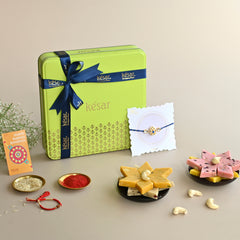 Assorted Kaju Katli in Tin Box with Royal Rakhi
